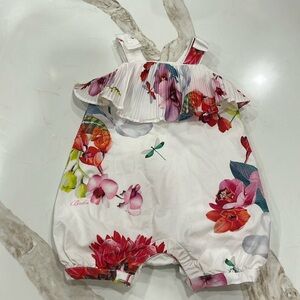 Gorgeous white floral print cotton infant girls snap leg romper from Ted Baker